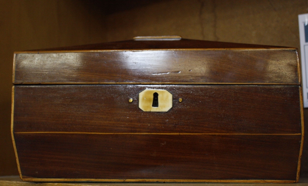 A mixed lot to include a sarcophagus shaped tea caddy, a two train mahogany mantel clock, a bronze