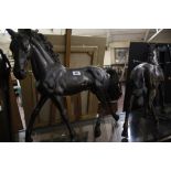 Two bronzed models of stallions 46cm high Best Bid