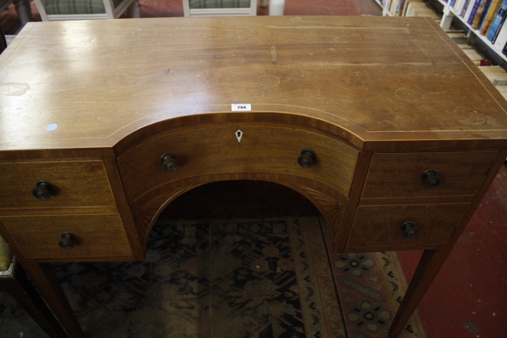 A Regency style mahogany twin pedestal dining table with one additional leaf 245cm length with eight