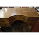 A Regency style mahogany twin pedestal dining table with one additional leaf 245cm length with eight