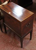 An early 19th mahogany and inlaid cellarette on square tapering legs