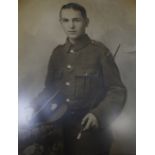 A photo of 1st WW Private Osbourne in a gilt frame, 48cm x 38.5cm Best Bid