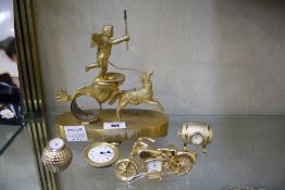 A French gilt mantel clock, cherub riding a chariot, the enamel face marked 'Berthoud' A Paris and