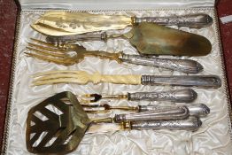 A canteen of cutlery, a further nine boxes of silverplate teaspoons, fish servers and other table