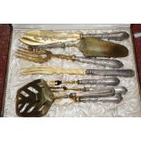 A canteen of cutlery, a further nine boxes of silverplate teaspoons, fish servers and other table