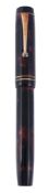 Parker, Duofold, a red marbled fountain pen, with a red marbled cap and barrel  Parker, Duofold, a