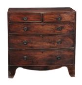 A mahogany bow fronted chest of drawers , first quarter 19th century  A mahogany bow fronted chest