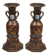 A pair of Japanese porcelain faux lacquer floor vases and painted wood stands  A pair of Japanese
