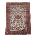 A Qum silk rug, approximately 158cm x 110cm , together with a Qum rug  A Qum silk rug,