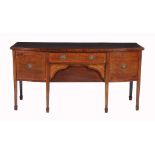 A George III mahogany bowfront sideboard, circa 1800 A George III mahogany bowfront sideboard, circa