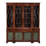 A mahogany and inlaid library bookcase, in George III style  A mahogany and inlaid library bookcase,