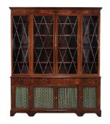 A mahogany and inlaid library bookcase, in George III style  A mahogany and inlaid library bookcase,