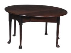 A George II mahogany drop leaf supper table, circa 1750  A George II mahogany drop leaf supper