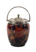 Pomegranate, a Moorcroft ovoid biscuit barrel, with electroplated swing handle  Pomegranate, a