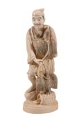 An Ivory Okimono of a Cormorant Fisherman An Ivory Okimono of a Cormorant Fisherman, the figure