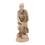 An Ivory Okimono of a Cormorant Fisherman An Ivory Okimono of a Cormorant Fisherman, the figure