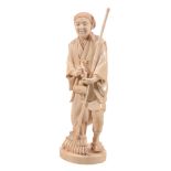 An Ivory Okimono of a Gardener, the figure wearing a short robe over hakama An Ivory Okimono of a