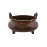 A large Chinese bronze censer, Qing Dynasty, of circular form A large Chinese bronze censer, Qing