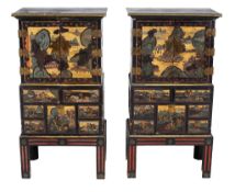 -1 A pair of Chinese black polychrome and gilt-decorated coromandel mounted... -1 A pair of