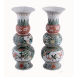 A pair of Chinese Famille Verte triple-gourd vases, 19th century A pair of Chinese Famille Verte