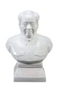 A white porcelain bust of Chairman Mao, circa 1960, with slogans at its base A white porcelain