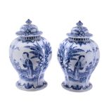 A pair of Chinese blue and white vases and covers, late Qing Dynasty A pair of Chinese blue and