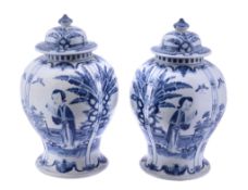 A pair of Chinese blue and white vases and covers, late Qing Dynasty A pair of Chinese blue and