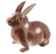 A Chinese porcelain model of a rabbit, late 19th or 20th century A Chinese porcelain model of a