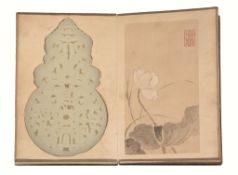 A Chinese white jade archaistic disc, bi, 19th or 20th century A Chinese white jade archaistic disc,