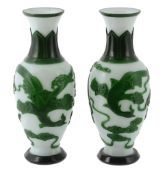 A pair of Peking glass emerald-green overlay vases A pair of Peking glass emerald-green overlay