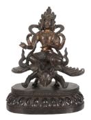 A Chinese gilt-bronze of Vishnu riding on Garuda, probably Qing Dynasty A Chinese gilt-bronze of
