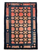 A Chinese wool rug, circa 1900-1930, probably Western China A Chinese wool rug, circa 1900-1930,