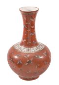 A Chinese red-ground 'butterfly' vase, Guangxu mark and possibly of the period A Chinese red-