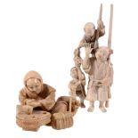 An Ivory Okimono of a Farmer, he firmly holds a ladder that is strapped to... An Ivory Okimono of