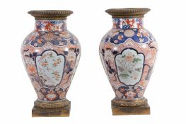 -108 A Pair of Japanese Arita Vases, each of inverted baluster form rising... -108 A Pair of
