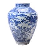A large Japanese Arita blue and white vase A large Japanese Arita blue and white vase, painted
