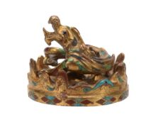A Chinese Han-style gilt metal dragon and stand , inlaid with coloured stones A Chinese Han-style