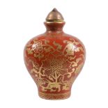 A Chinese coral-ground snuff bottle and cover , late Qing / 20th century A Chinese coral-ground