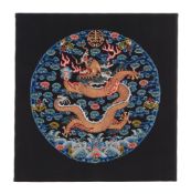 A side facing Imperial Chinese dragon roundel , Qing Dynasty, circa 1850 A side facing Imperial