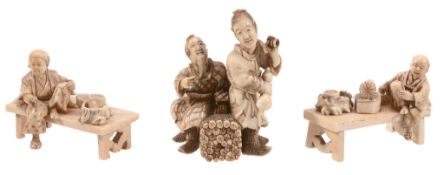 An Ivory Okimono carved as an elderly, bearded man seated on a large bundle... An Ivory Okimono