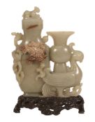 A Chinese celadon and russet jade vase and cover, 20th century A Chinese celadon and russet jade