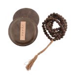 A set of one hundred and eight Chinese Chen Xiang or similar wood beads A set of one hundred and