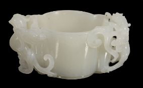 A Chinese white jade cup, 20th century, of lobed circular section A Chinese white jade cup, 20th