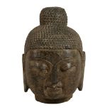 A large Chinese grey stone head of a Buddha, Ming Dynasty or later A large Chinese grey stone head