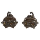 A Pair of Japanese Bronze Koros And Covers A Pair of Japanese Bronze Koros And Covers, each of