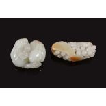 A Chinese white jade carving of two rabbits , with lingzhi, 4 A Chinese white jade carving of two