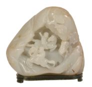 -1 A Chinese celadon and russet jade bolder carving, probably Qing Dynasty -1 A Chinese celadon