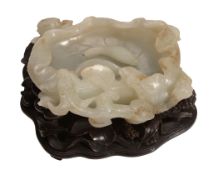 A Chinese celadon and russet jade 'Lotus' brush washer A Chinese celadon and russet jade 'Lotus'