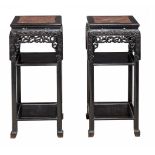 A pair of Chinese hardwood marble inset stands, late Qing A pair of Chinese hardwood marble inset