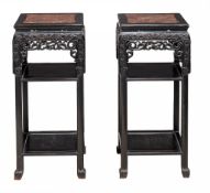 A pair of Chinese hardwood marble inset stands, late Qing A pair of Chinese hardwood marble inset